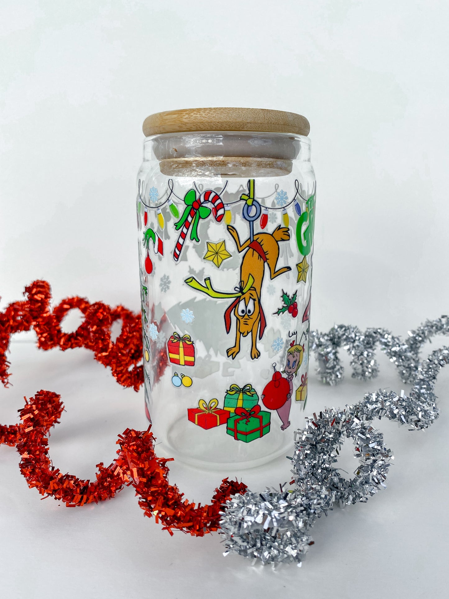 Mean Green Christmas Scene 16 Ounce Glass Cup With Lid and Glass Straw